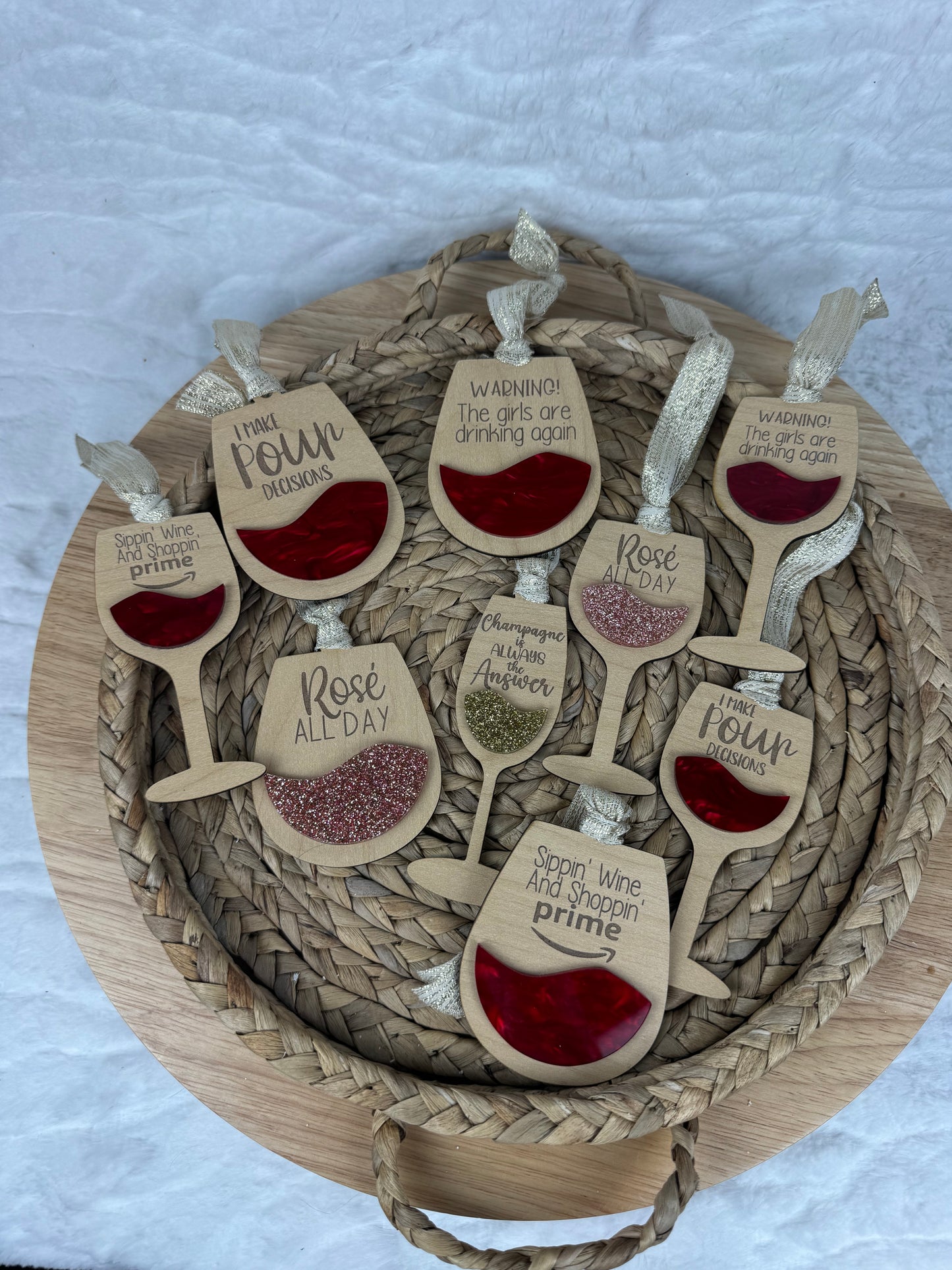 Holiday wine glass ornaments with playful sayings